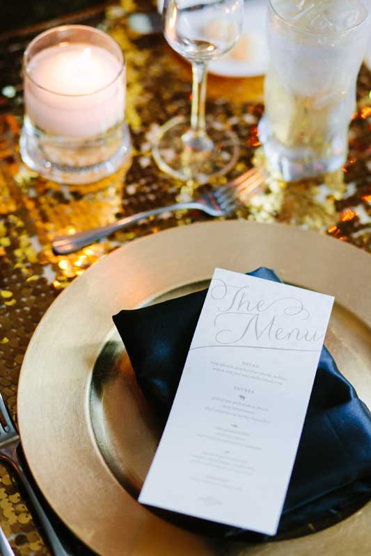 41-patricia-ivan-wedding-reception-gold-charger-plate-napkin-menu-card-candles